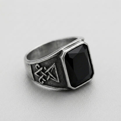 Signet Ring with Black Gemstone and Engraved Symbol