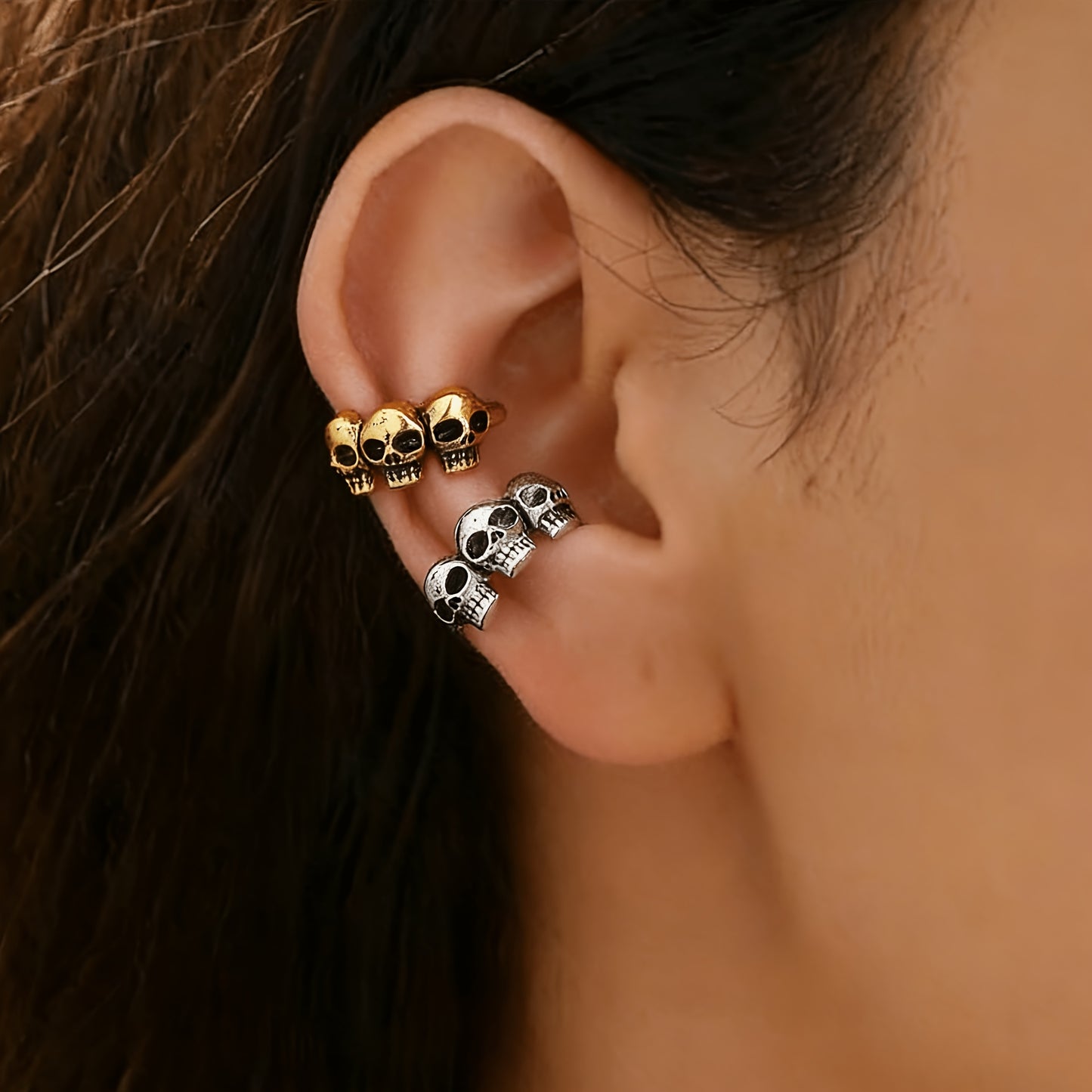 A Single Vintage Skull Ear Without Ear Piercings Featuring a Cool