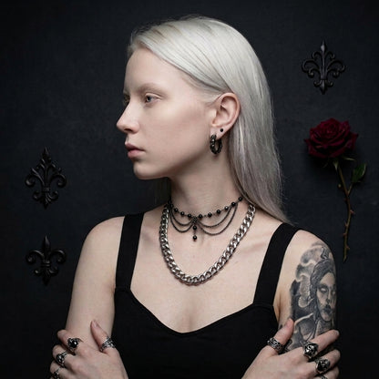 Stacked Skulls Huggie Hoops