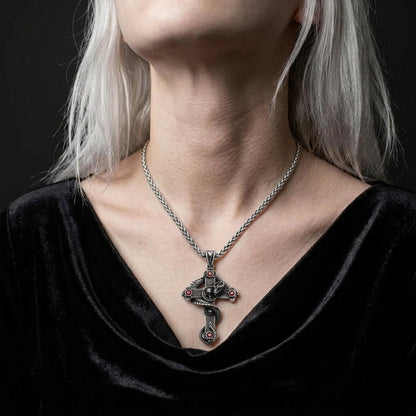 Snake and Skull Cross Necklace with Red Gemstones