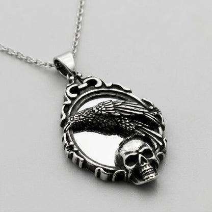 Raven and Skull Ornate Frame Pendant Necklace